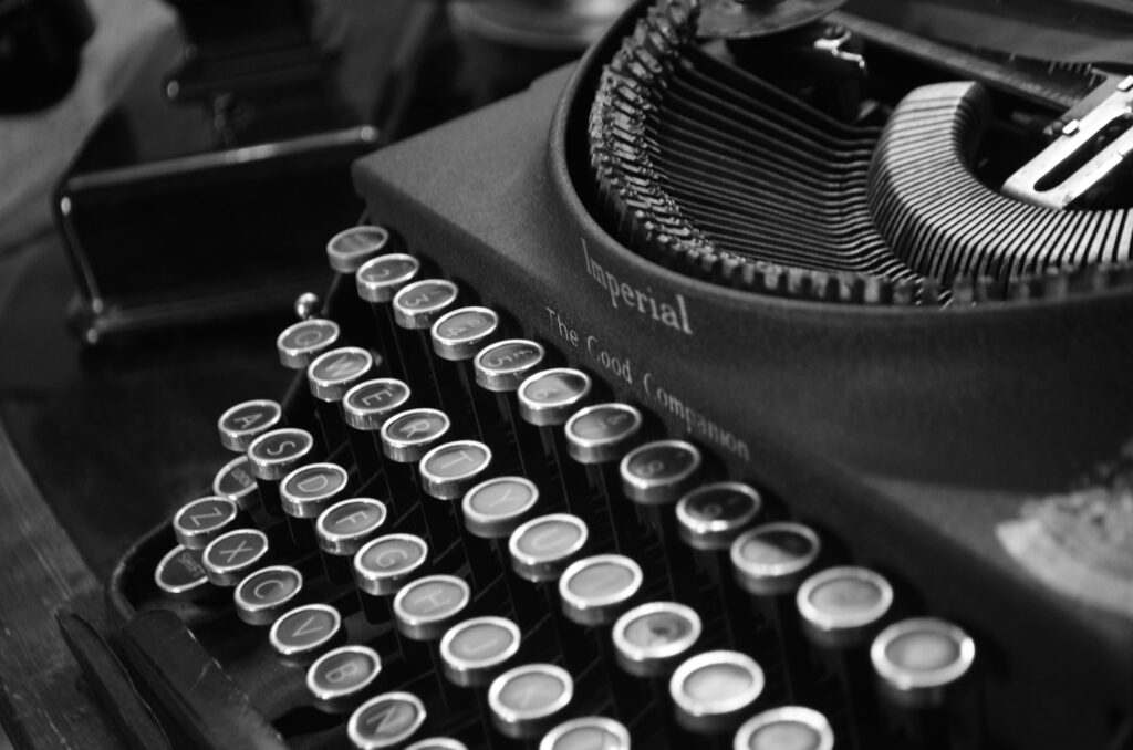 Close-up of the keys of an old typewriter in low light
